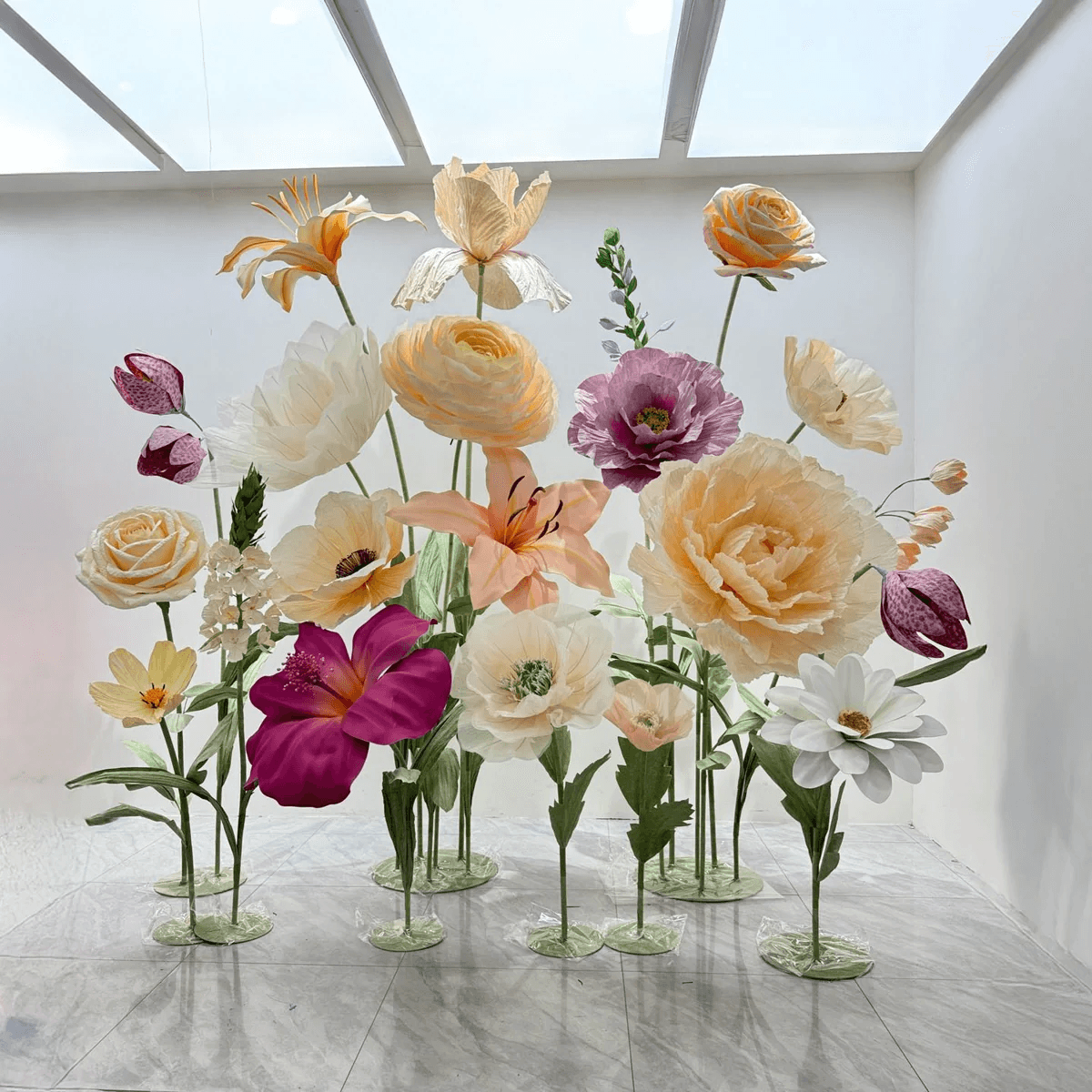 Oversized paper flower cluster in peach, cream and purple
